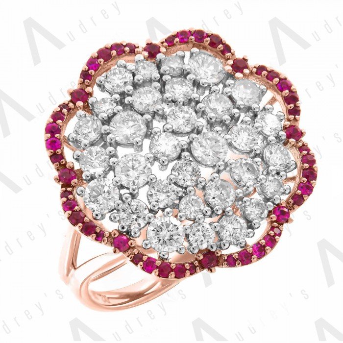 18 KARAT DIAMOND AND GEMSTONE RING