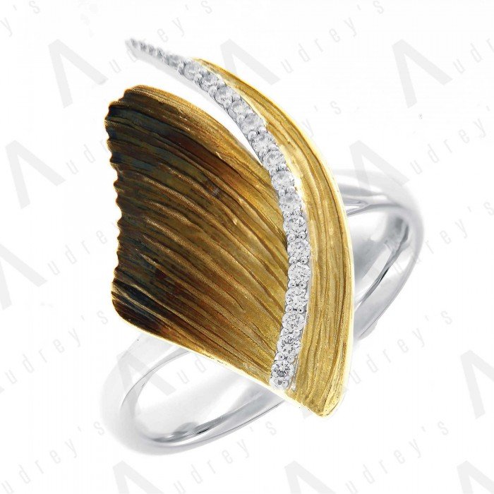 18 KARAT DIAMOND AND GEMSTONE RING