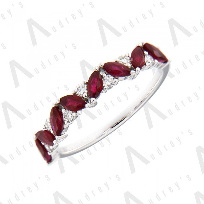 18 KARAT DIAMOND AND GEMSTONE RING