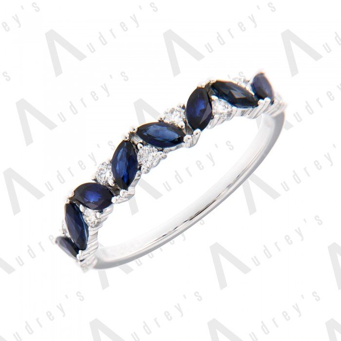 18 KARAT DIAMOND AND GEMSTONE RING