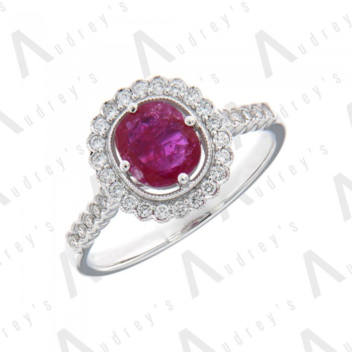 18 KARAT DIAMOND AND GEMSTONE RING