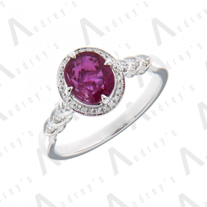18 KARAT DIAMOND AND GEMSTONE RING