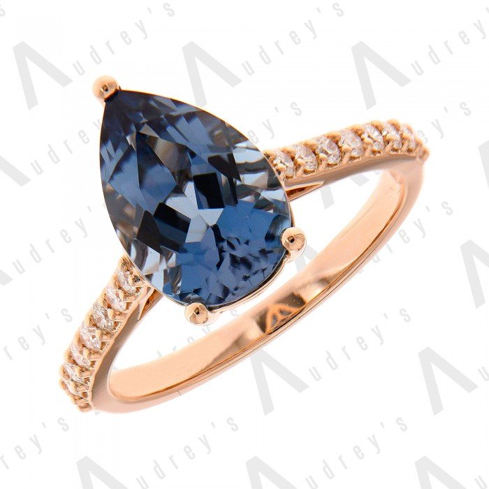 18 KARAT DIAMOND AND GEMSTONE RING