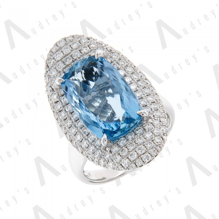 18 KARAT DIAMOND AND GEMSTONE RING
