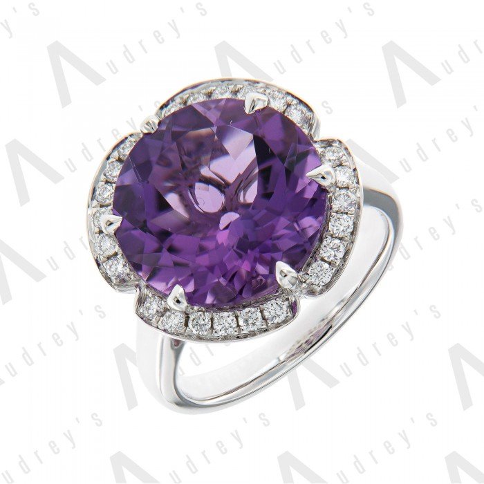 18 KARAT DIAMOND AND GEMSTONE RING