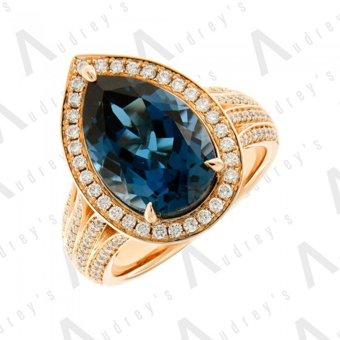 18 KARAT DIAMOND AND GEMSTONE RING