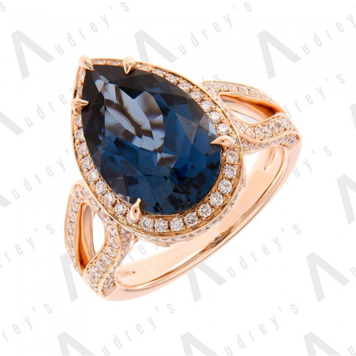 18 KARAT DIAMOND AND GEMSTONE RING