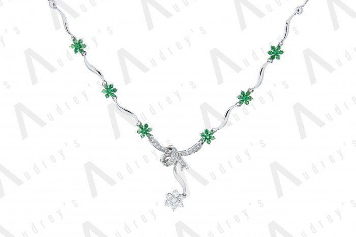 18 KARAT DIAMOND AND GEMSTONE NECKLACE
