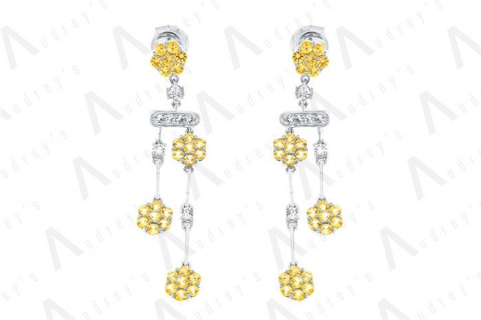 18 KARAT DIAMOND AND GEMSTONE EARRING