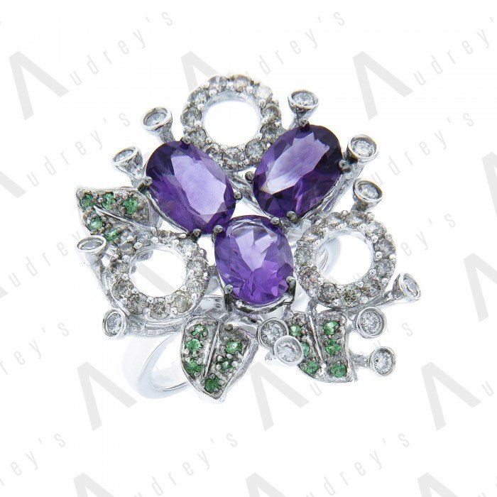 18 KARAT DIAMOND AND GEMSTONE RING