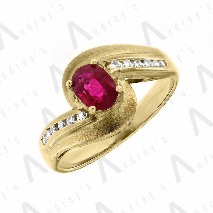 18 KARAT DIAMOND AND GEMSTONE RING