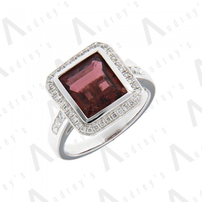 18 KARAT DIAMOND AND GEMSTONE RING