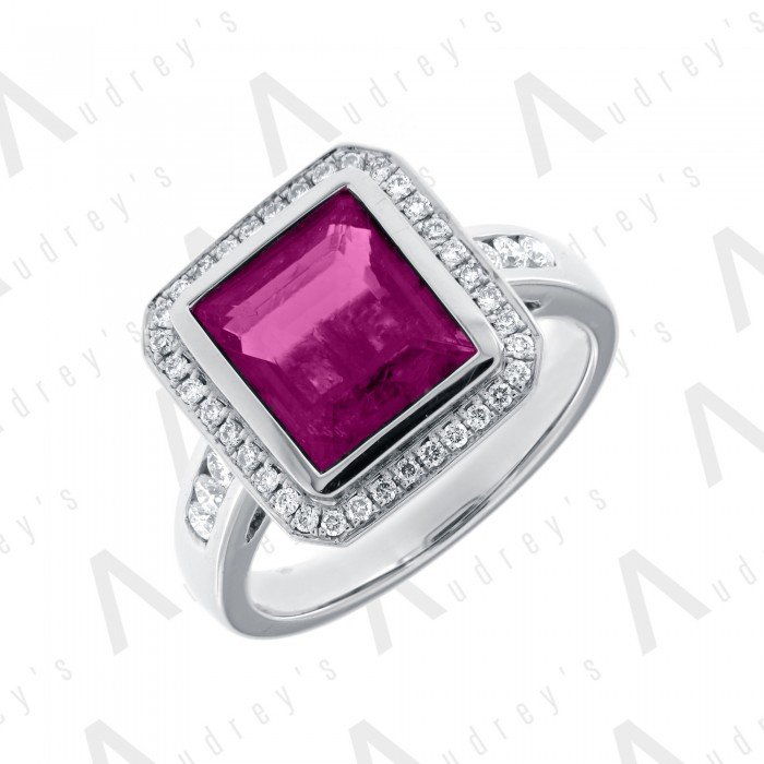 18 KARAT DIAMOND AND GEMSTONE RING