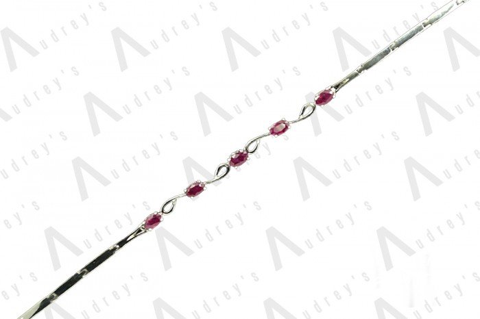 18 KARAT GEMSTONE BRACELET