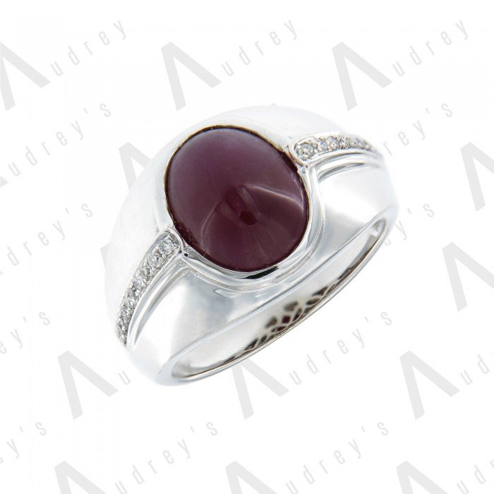 9 KARAT DIAMOND AND GEMSTONE RING