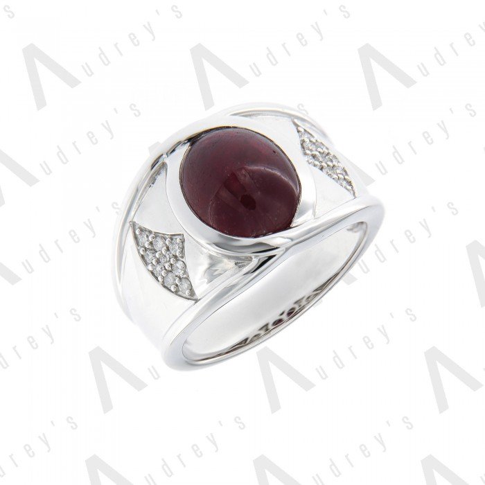 9 KARAT DIAMOND AND GEMSTONE RING
