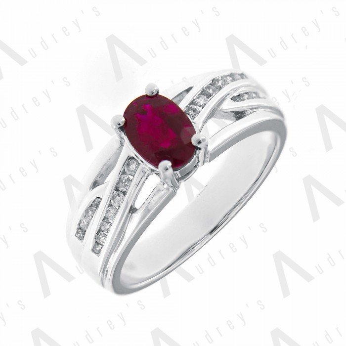 18 KARAT DIAMOND AND GEMSTONE RING