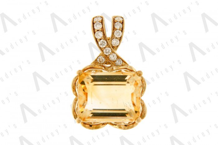 9 KARAT DIAMOND AND GEMSTONE PENDANT
