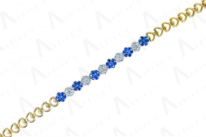 18 KARAT DIAMOND AND COLOR STONE BRACELET