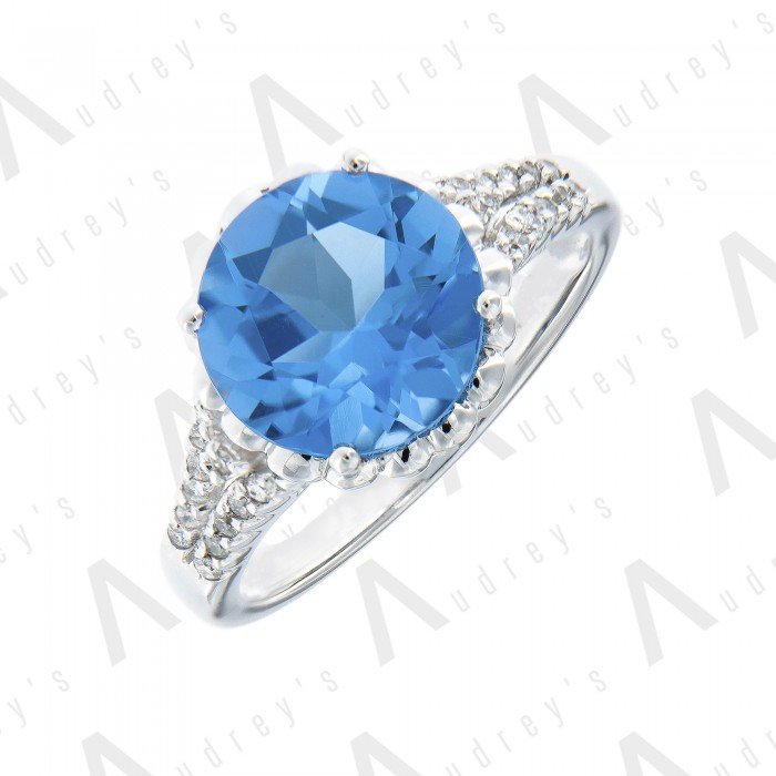 9 KARAT DIAMOND AND GEMSTONE RING