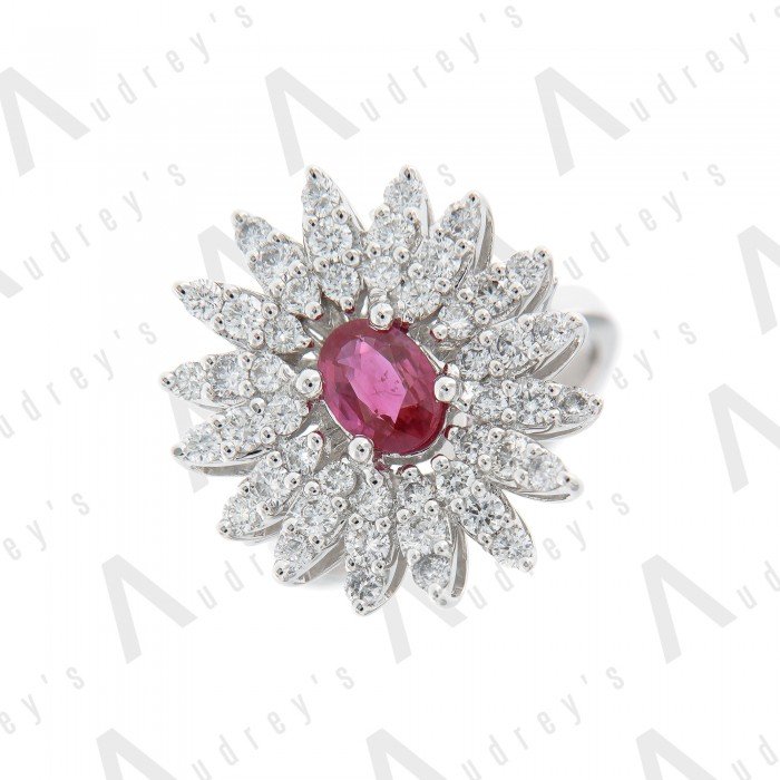 18 KARAT DIAMOND AND GEMSTONE RING