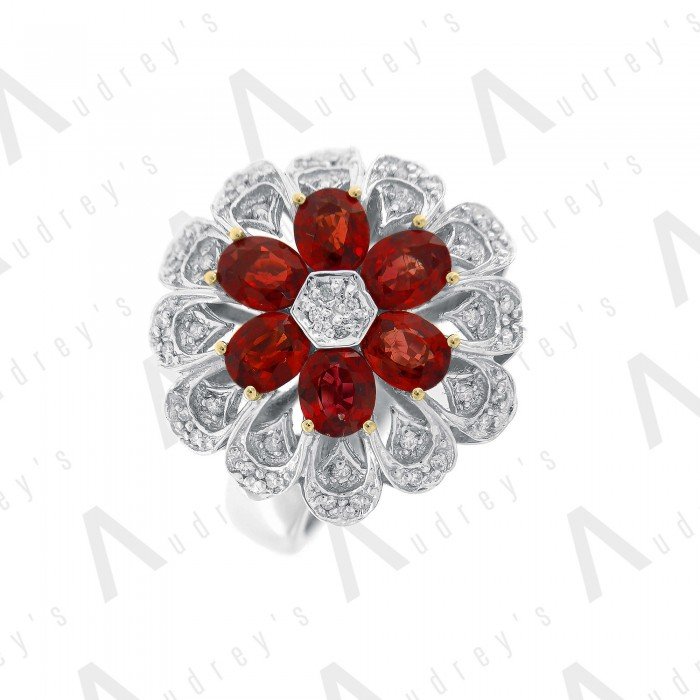 18 KARAT DIAMOND AND GEMSTONE RING