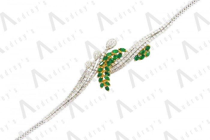 18 KARAT DIAMOND AND GEMSTONE BRACELET