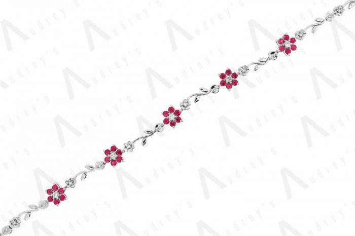 9 KARAT DIAMOND AND GEMSTONE BRACELET