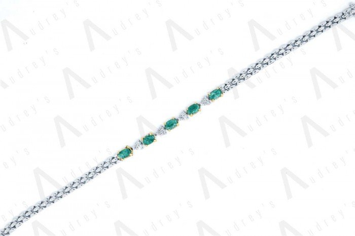 18 KARAT DIAMOND AND GEMSTONE BRACELET