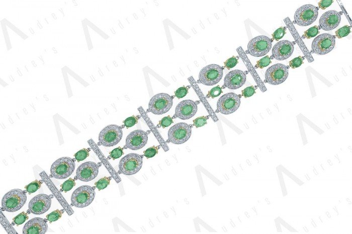 18 KARAT DIAMOND AND GEMSTONE BRACELET